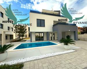 Luxusná novostavba vila s bazénom blízko mora a výhľadom na more v Chorvátsku na ostrove