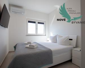 Na predaj: Priestranný 4 izbový apartmán na ostrove Vir v Chorvátsku