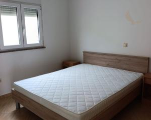 Chorvátsko - Na predaj rodinný  dom s dvoma apartmánmi na ostrove Vir