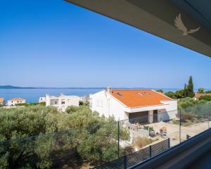Novostavba apartmán s výhľadom na more, 150m od mora v Chorvátsku - Zadar- Kožino
